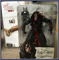 Jigsaw Killer & Saw Puppet from Cult Classics - Series 5 manufactured by Neca [Front]