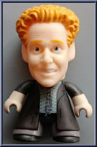 Janosz (Blue Suit) Action Figure
