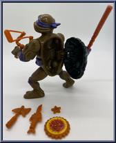 Donatello (with Storage Shell) from Teenage Mutant Ninja Turtles - Storage Shell Turtles manufactured by Playmates [Loose]