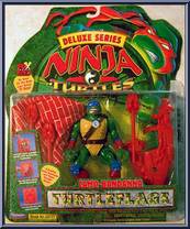Camo-Bandana Leonardo from Teenage Mutant Ninja Turtles - Next Mutation - Turtleflage - Deluxe Figures manufactured by Playmates [Front]