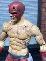 Daredevil (Marvel Legends) Custom Action Figure [Torso and head damage close up]